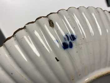 A ribbed Dutch Delft blue and white chinoiserie 'dragon' dish, 18th C.